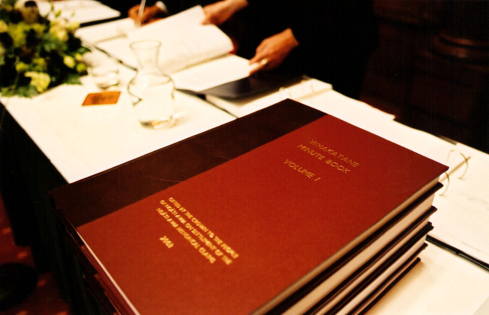 Publication of the Whakatāne Minute Book, Volume One, 2003. A full set of minute books was gifted by the government to the people of Ngāti Awa upon settlement of the Ngāti Awa Treaty Claim. Image supplied by <a href='https://www.ngatiawa.iwi.nz/' class='external-link' target='_blank' rel='noopener'>Te Rūnanga o Ngāti Awa</a>
